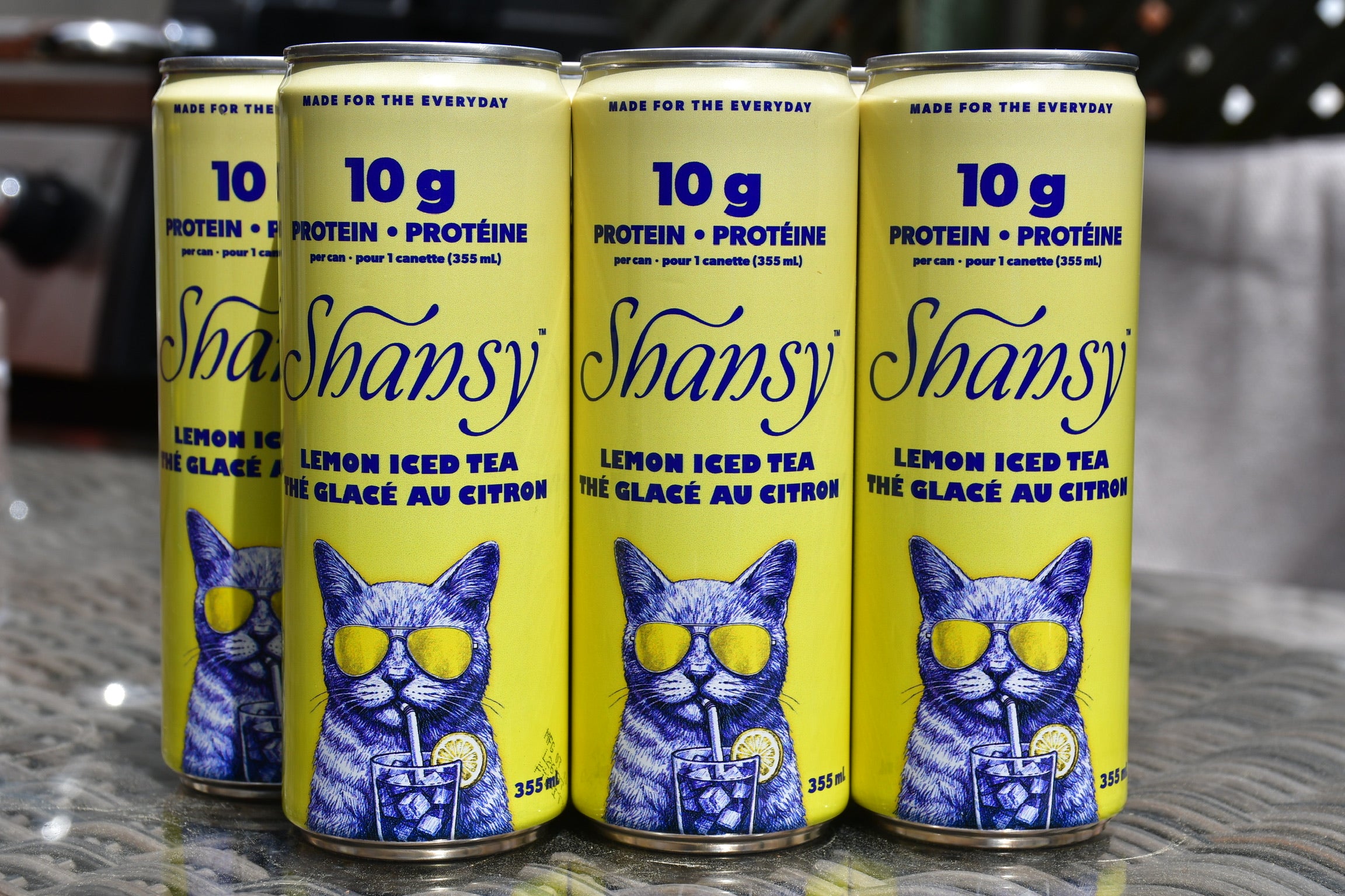 Shansy Lemon Protein Iced Tea can on a bright background